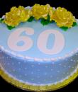 Yellow Roses 60th Birthday Cake, Blue buttercream iced, round decorated with roses and dots. Everything on this cake is EDIBLE. (Serves 8-80 party slices)