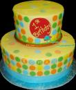 Balloon 1st Birthday Cake,  Yellow buttercream iced, 2 round tiers decorated with circles, and a balloon. Everything on this cake is EDIBLE. (Serves 28-55 party slices)