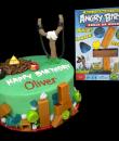 Angry Birds Birthday Cake,  Green Buttercream iced,   round decorated with plastic angry birds figures from the knock on wood game.   (Plastic character figurine was provided by client). (Serves 8-80 party slices)